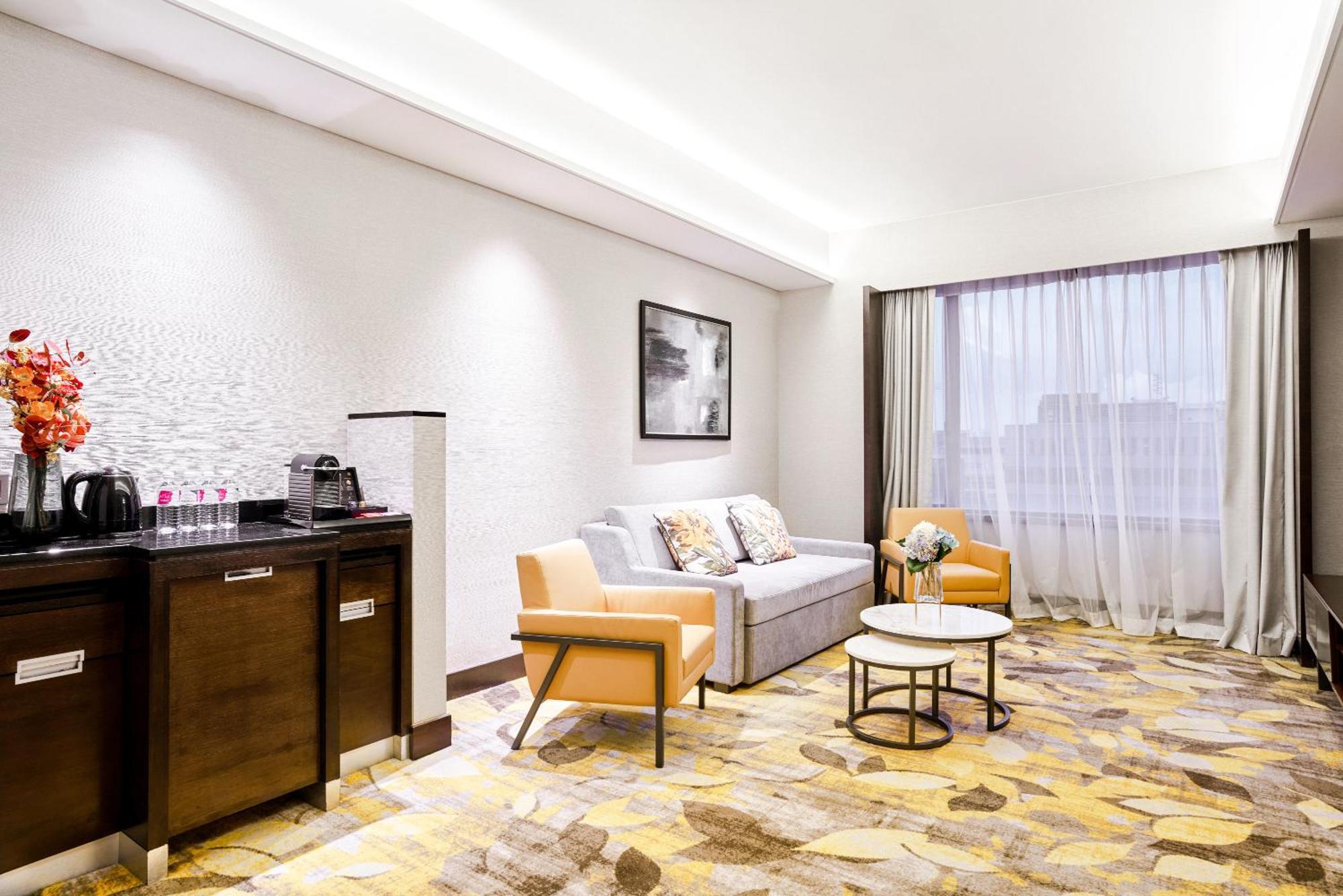 Royal Plaza On Scotts Singapura Exterior foto A suite at the hotel
